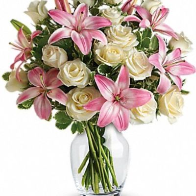 <div class="m-pdp-tabs-description">
<div id="mark-3" class="m-pdp-tabs-marketing-description">A romantic gift like this one is always appreciated. An eye-catching display of roses and lilies is perfectly arranged in a feminine vase which makes a beautiful and lasting impression.</div>
</div>
<p id="arrngDescp">Elegant white roses and sweet pink asiatic lilies are hand-arranged with greens. It's the perfect way to show you love them always and forever.</p>